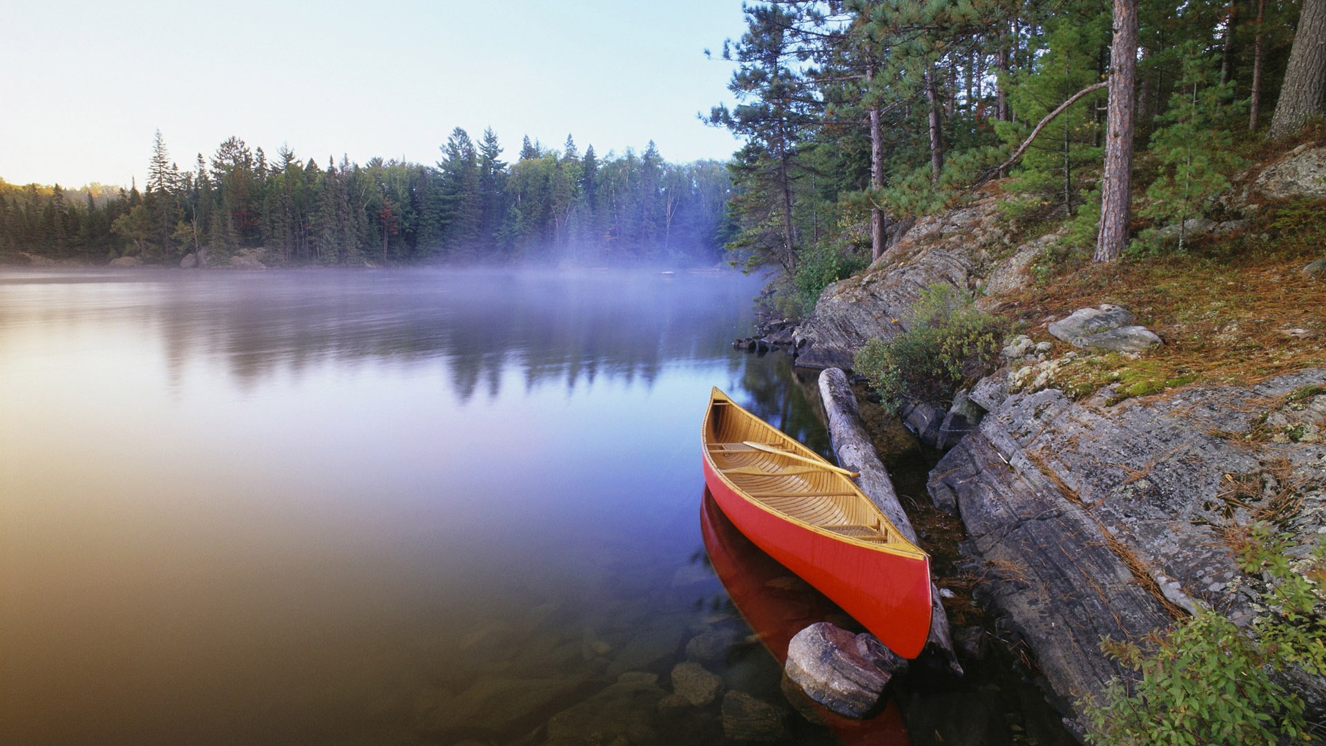 Canoe on a riverbank